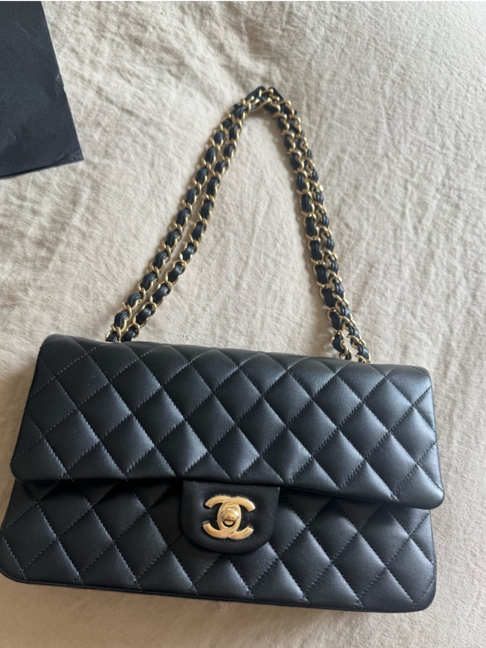 CHANEL Black Quilted Shoulder Bag with Gold Hardware